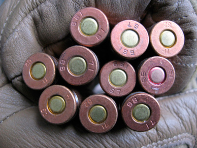 A hand holds a sample from shipments of the Chinese-made ammunition sent to the Afghan National Army from AEY. (AP/U.S. Army)