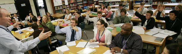 New Teach for America teachers sit in a training session before beginning their two-year stints in disadvantaged schools. (AP/David J. Phillip)