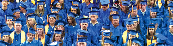 Sheridan College graduated prepare for commencement. With college graduation rates dropping, only 34 percent of students now finish a bachelor's degree in four years. (AP/Jordan Edgcomb)