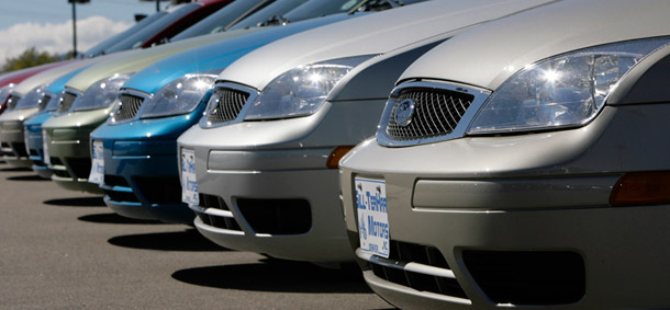 Automakers saw increased sales of fuel-efficient cars like the Ford Focus, seen here, in April, while sales of light trucks declined.
  (AP/David Zalubowski)