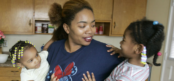 Kim Tillman of Indianapolis cannot vote in Indiana because she does not have a state-issued photo identification. The rising use of ID systems should focus policy makers on the existence of a growing “ID divide” and the challenges it will present for Americans. (AP/Michael Conroy)