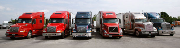 Several trucks sit parked at a Weston, Fla. truck stop yesterday. Two of them have for sale signs in the window. One truck driver said his costs rose from $5,000 a month for fuel last year to over $8,000 a month this year. (AP/J. Pat Carter)