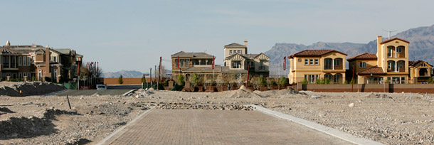 An unfinished development in suburban Las Vegas awaits completion. Struggling homeowners who bought when the market was high are now stuck with resetting adjustable-rate mortgages and payments they can't afford. New legislation could help them avoid foreclosure. (AP/Isaac Brekken)