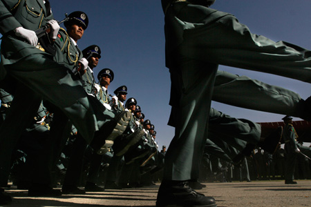 New members of the Afghan National Police march in a graduation ceremony in Kabul in May, 2008. (AP/Rafiq Maqbool)
