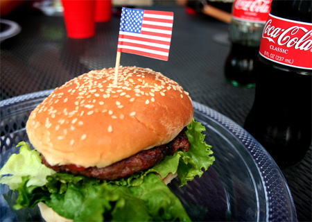 With gas and food prices soaring, the American family's summer barbecue may be the next victim of the middle class squeeze. (Flickr/glynnish)