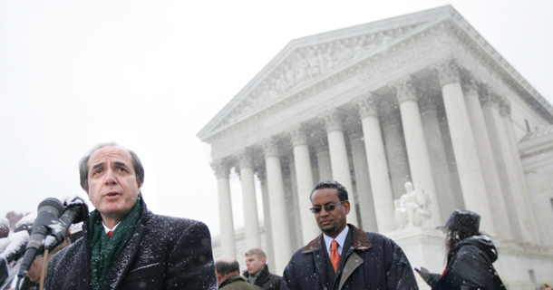 Attorney David Remes, left, accompanied by Vincent Warren, Executive director of the Center for Constitutional Rights, speak to reporters outside the Supreme Court when the court heard arguments in <i>Boumediene v. Bush</i> back in December. (AP/Lawrence Jackson)