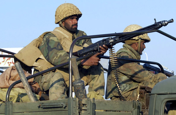 Pakistani army troops move toward the area of Dara Adam Khel, near Peshawar, Pakistan, in an operation against militants. A new GAO report cites a lack of oversight in U.S. funds to Pakistan for counterrorism activities. (AP/Mohammad Zubair)