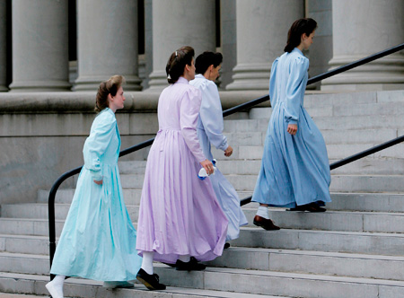 Members of the Fundamentalist Church of Jesus Christ of Latter Day Saints arrive at the Tom Green County Courthouse in San Angelo, Texas. (AP/Eric Gay)