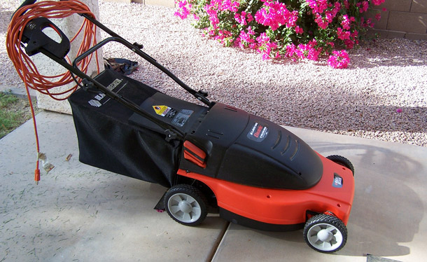 Electronic lawn mowers, such as the one above, are smaller, require less maintenance, and create zero exhaust emissions. (flickr/Arizona Shona)