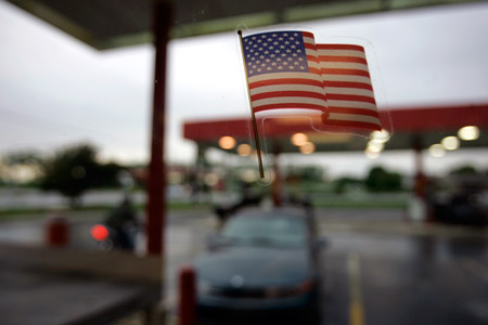 Families are feeling the economic pressure, as the price of basic necessities keep rising. Gas prices in June 2008, for example, were up 39 percent over June 2007. (AP Photo/Carolyn Kaster)