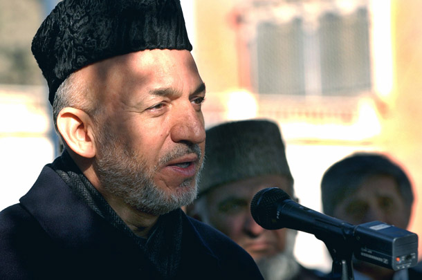 Afghan President Hamid Karzai speaks to the media outside the presidential palace in Kabul. Network newscasts have devoted only 46 minutes of coverage to Afghanistan since Jan.1 of this year. (AP/Musadeq Sadeq)