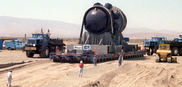 A decommissioned nuclear reactor is prepared for burial under 45 feet of soil and rock at the Hanford Nuclear Reservation in Washington state. Safe disposal is only one roadblock to widespread adoption facing nuclear power. (AP Photo/Jackie Johnston)