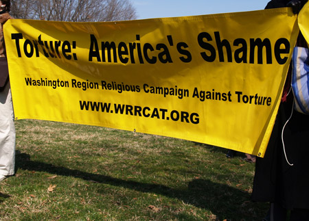 Members of the Washington Region Religious Campaign Against Torture display a banner at the Public Witness Against Torture event in Washington, D.C. on March 10, 2008. (flickr/takomabibelot)