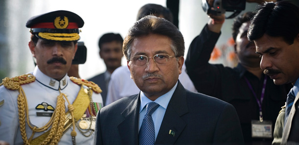 Outgoing President Pervez Musharraf is surrounded by top military officers as he leaves the Presidential House in Islamabad after announcing his resignation. (AP/Emilio Morenatti)
