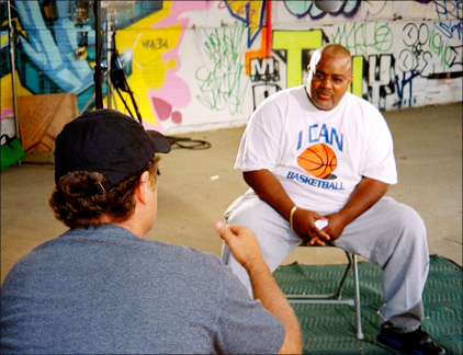 Director Stacy Peralta interviews Rock Jonson, an Amer-I-Can Gang Intervention Specialist on the set of "Made in America." (Tanya Sakolsky)