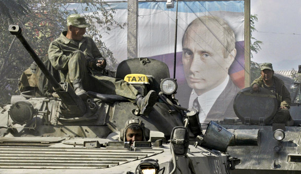 Russian soldiers sit atop a tank in Tskhinvali, the main city in the breakaway Georgian province of South Ossetia on August 20, 2008. (AP/Dmitry Lovetsky)