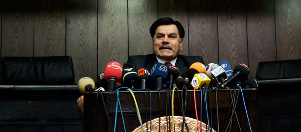 Hasim Kilic, Chairman of the Constitutional Court, center, announces the court's decision at a news conference in Ankara, Turkey, Wednesday, July 30, 2008. (AP/Burhan Ozbilici)