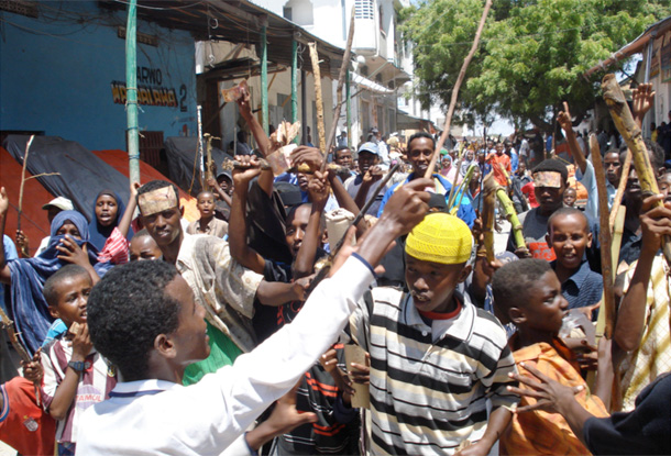 Somali's demonstrate against high food prices earlier this year in the capital Mogadishu. Troops opened fire and killed at least two people among tens of thousands of people rioting. (AP/Mohamed Sheikh Nor)