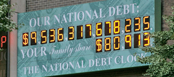 The National Debt clock ticks upward in New York. The $700 billion bailout of the financial sector could push the debt up to $11 trillion. (AP/Bebeto Matthews)