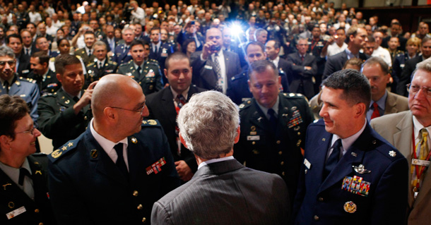 President Bush greets military personnel after delivering remarks to the National Defense University's Distinguished Lecture Program today. (AP/Pablo Martinez Monsivais)