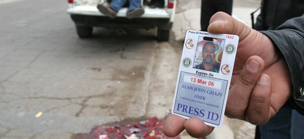 The U.S.-issued ID card of an Iraqi translator who died in 2006 while working with an American journalist. The United States ranks 119th for how it treats journalists in the foreign areas it controls, such as Iraq and Afghanistan. (AP/Hadi Mizban)