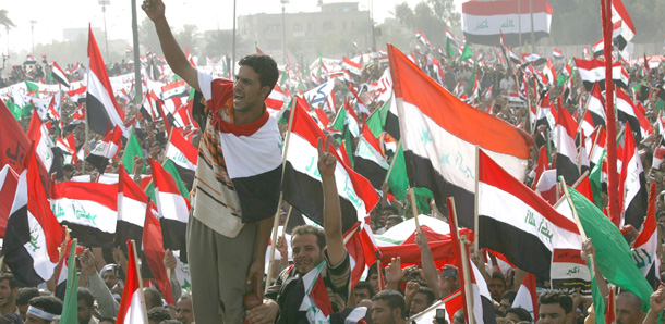 Followers of Shiite cleric Muqtada al-Sadr take part in a rally in Baghdad, Iraq, on Saturday to protest a draft U.S.-Iraqi security agreement. (AP/Hadi Mizban)