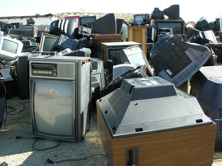 TVs sit in their final resting place at a landfill. The Environmental Protection Agency estimated that in 2005, discarded electronics totaled 2 million tons, of which only 15 to 20 percent was recycled. (Flickr/z1boise)