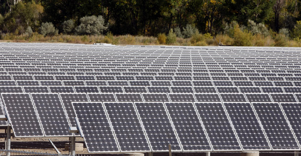A sea of solar panels powers city facilities in Rifle, CO. To help spur growth and reduce oil use, a Renewable Electricity Standard could be created that requires utilities to generate 20 percent of their electricity from renewables. (AP/David Zalubowski)
