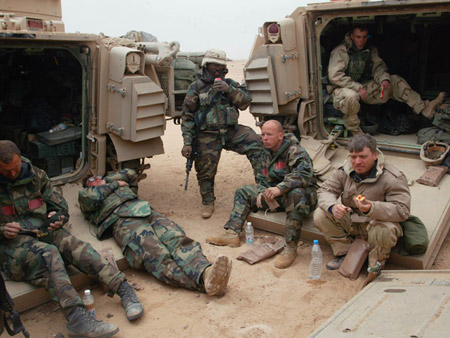 Chris Tomlinson of the Associated Press was embedded with U.S. Army soldiers from the A Company 3rd Battalion, 7th Infantry Regiment, about 100 miles south of Baghdad in 2003. The Army has grown more reluctant to embed reporters since the start of the war. (AP/John Moore)