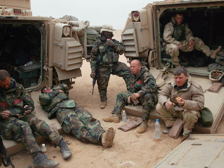 Chris Tomlinson of the Associated Press was embedded with U.S. Army soldiers from the A Company 3rd Battalion, 7th Infantry Regiment, about 100 miles south of Baghdad in 2003. The Army has grown more reluctant to embed reporters since the start of the war. (AP/John Moore)