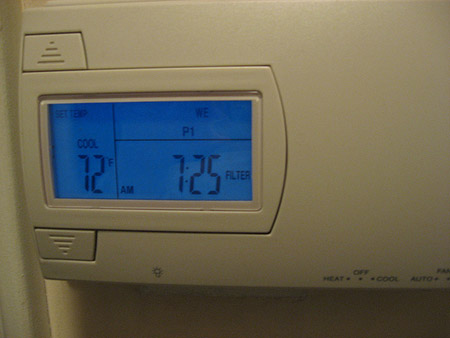 Resetting your thermostat back to 65 degrees from 72 degrees for eight hours a day can cut your heating bill by up to 10 percent. Installing a programmable thermostat can ensure you never forget to turn the heat down. (Flickr/laeroport)