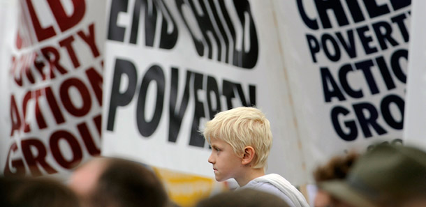 Demonstrators listen to speakers at a rally in Trafalgar Square in central London. The British government has set 2010 as a target date to halve child poverty. (REUTERS/Toby Melville)