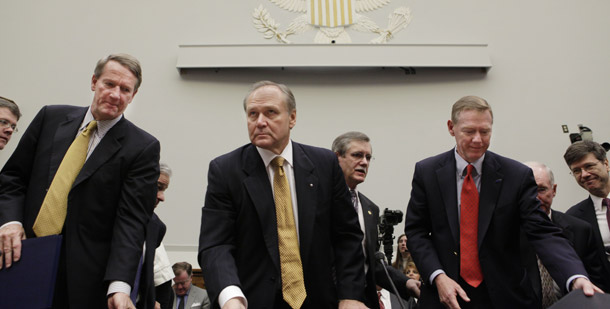 Auto industry executives, from left, General Motors CEO Richard Wagoner; Chrysler CEO Robert Nardelli; and Ford CEO Alan Mulally, take their seats on Capitol Hill on November 19, 2008. Congress could create a federal bridge loan of $38 billion that would help these companies stabilize, prevent economic catastrophe, and help them build more fuel-efficient cars. (AP/Evan Vucci)