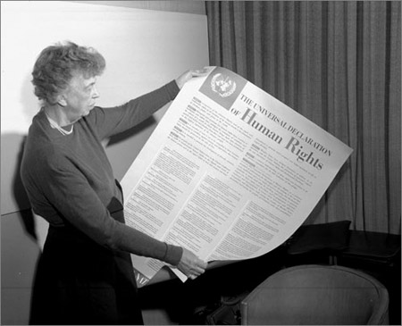 Eleanor Roosevelt holds the Universal Declaration of Human Rights, which was implemented on December 10, 1948. (UN Photo)