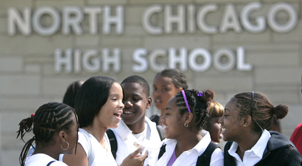 The experience of the Chicago public schools offer important lessons for increasing college enrollment and success. (AP/Charles Rex Arbogast)