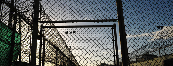 Razor wire tops fences at the Camp Six detention facility on the U.S. Naval Base in Guantánamo Bay, Cuba. (AP/Mandel Ngan)