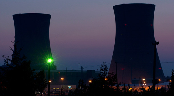 The sky lightens just before dawn behind the cooling towers of the Perry Nuclear Power Plant in Perry, Ohio. (AP/Jamie-Andrea Yanak)