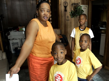 "I can't afford to add on the additional medical and dental insurance it takes to take care of my children," says Marian Blackmon of Jackson, Mississippi. (AP/Rogelio Solis)