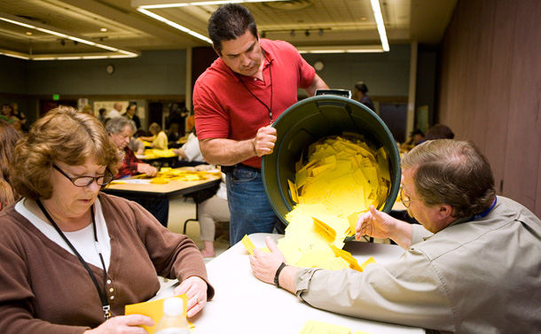 Boeing Machinists union members count ballots after voting on a new contract offered by the company. (AP/Stephen Brashear)