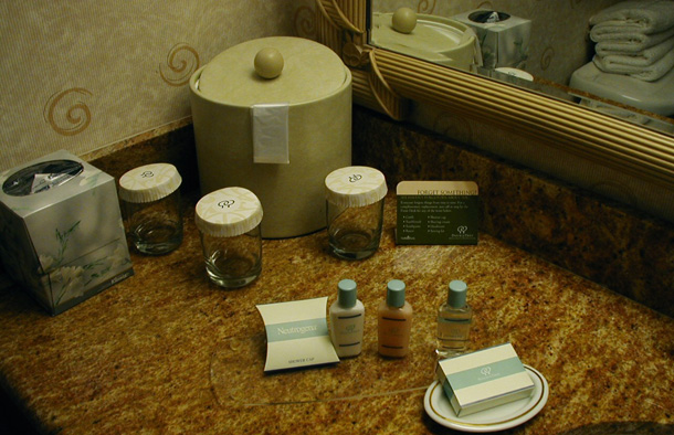 Avoiding complimentary shampoo and other toiletries by using refillable bottles can minimize your impact on the hotel and the city you're staying in. (Flickr/Miss Shari)