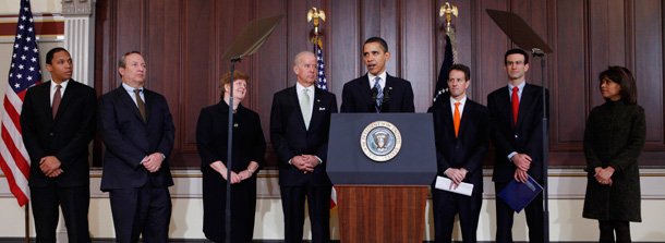 President Barack Obama stands with his economic team as he speaks about his fiscal 2010 federal budget. (AP/Charles Dharapak)