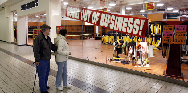 Shoppers pause to look at a store promoting a "going out of buisness" sale at the Liberty Tree Mall in Danvers, MA, last month. The House and Senate's agreed upon recovery and reinvestment package is a huge step forward as our nation seeks to recover from a recession that has cost 3.6 million jobs since December 2007. (AP/Winslow Townson)