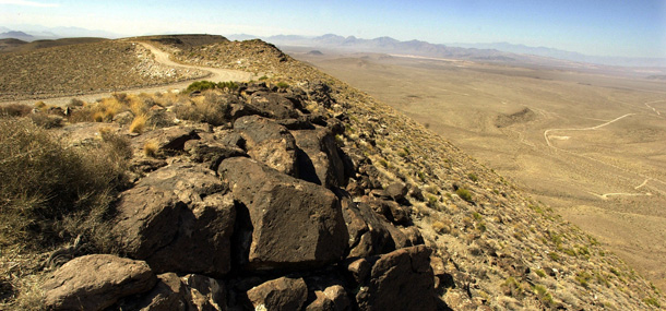 President Obama's budget includes a plan to develop a more effective nuclear waste disposal process. The proposed Yucca Mountain storage facility (shown above) poses a real risk of truck accidents or railroad derailments. (AP/Joe Cavaretta)