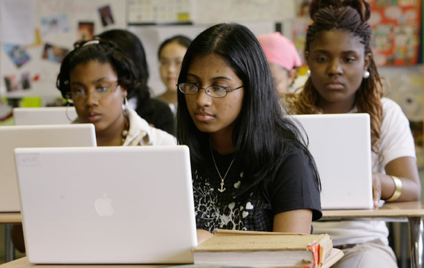 Students work on laptops at the Philadelphia High School for Girls in Philadelphia, Pensylvannia. Strategic investments in our education system now will yield long-term benefits for students. (AP/Matt Rourke)