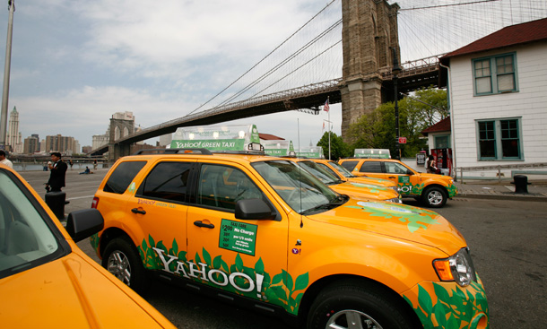 New York City's taxi fleet is now 15 percent hybrid vehicles, many of which are Ford Escape hybrids like these. (Flickr/<a href=