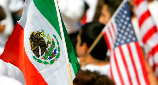The Mexico and U.S. flags, side by side. (AP/Danny Johnston)