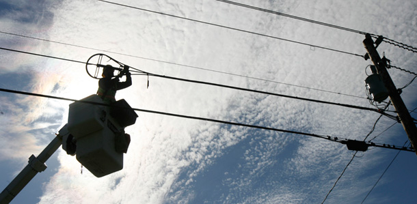 A worker installs fiber-optic cable in Norton, Vermont. (AP/Toby Talbot)