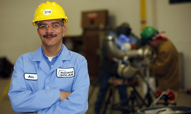 Ashutosh Misra, senior vice president of Ascent Solar, checks on work to prepare the plant for production in Thornton, CO, March 17, 2009. By 2030 Colorado could have more than 600,000 jobs in renewable energy and energy efficiency and nearly $62 billion in revenue. (AP/David Zalubowski)