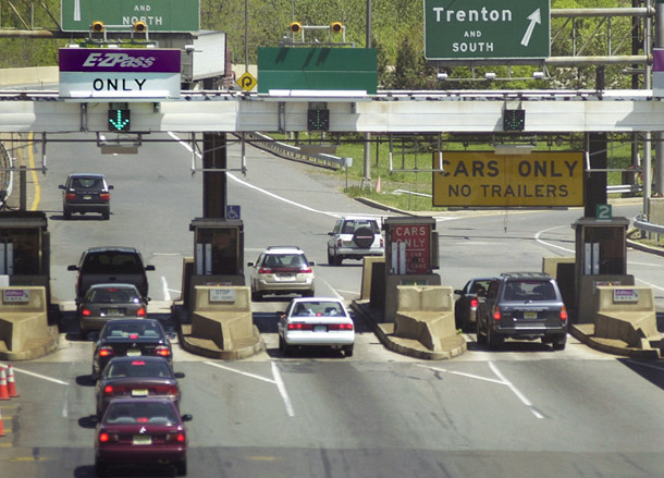 The American Clean Energy and Security Act would achieve a significant reduction in greenhouse gas pollution equivalent to taking 500 million cars off the road. (AP/Daniel Hulshizer)