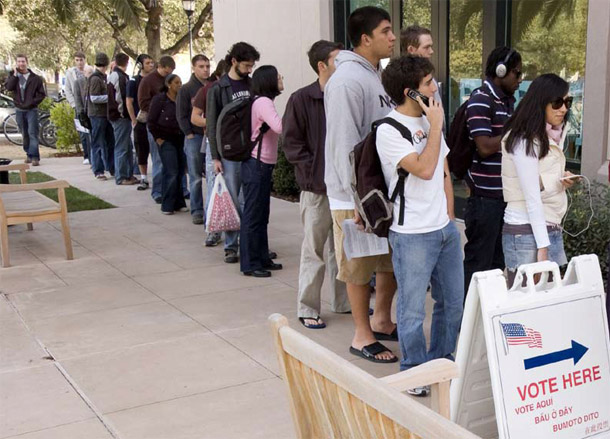 Young voters line up to cast their votes. The Millenial generation is more progressive than others, and shows it at the ballot box. (Flickr/Josh Thompson)